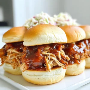 - 2 lbs boneless, skinless chicken breasts - 1 cup barbecue sauce (homemade or store-bought) - 1 medium onion, finely chopped - 2 cloves garlic, minced For the BBQ pulled chicken, you need the right main ingredients. Start with two pounds of boneless and skinless chicken breasts. This cut cooks well and shreds easily. You can use homemade or store-bought barbecue sauce. The sauce adds flavor and moisture to the chicken. Next, finely chop one medium onion and mince two cloves of garlic. These two ingredients enhance the taste and aroma of the dish. - 1 tablespoon apple cider vinegar - 1 tablespoon brown sugar - 1 teaspoon smoked paprika - 1 teaspoon cumin - Salt and pepper to taste - 8 slider buns - Coleslaw (optional, for topping) For flavor, add one tablespoon of apple cider vinegar. It gives a nice tang. Next, one tablespoon of brown sugar adds sweetness. Use one teaspoon each of smoked paprika and cumin for warmth. Finally, adjust salt and pepper to your liking. For serving, grab eight slider buns. If you want a crunchy element, add coleslaw on top of the sliders. This topping gives a fresh crunch that contrasts nicely with the tender chicken. First, I place the chicken breasts in the slow cooker. It is important to use boneless and skinless chicken for the best texture. Next, I mix the sauce ingredients in a bowl. I combine 1 cup of barbecue sauce, 1 medium chopped onion, 2 cloves of minced garlic, 1 tablespoon of apple cider vinegar, and 1 tablespoon of brown sugar. I add 1 teaspoon of smoked paprika, 1 teaspoon of cumin, and salt and pepper to taste. I stir this mix well until everything is combined. After mixing the sauce, I pour it over the chicken in the slow cooker. I make sure the chicken is well coated. Then, I cover the slow cooker and set it to low heat for 6-8 hours. If I am in a hurry, I can set it to high heat for 3-4 hours. I wait until the chicken is fully cooked and tender. Once the time is up, I take the chicken out and shred it with two forks. It should fall apart easily. I return the shredded chicken to the slow cooker and stir it into the sauce. I let it cook for an extra 15-20 minutes on low heat. This helps the chicken soak up all the tasty flavors. Now it’s time to prepare the buns. I toast the slider buns in a skillet or oven until they are lightly golden. Once toasted, I assemble the sliders. I put a generous scoop of pulled chicken on each bun. If I want, I can add coleslaw for a crunchy topping. This adds a nice contrast to the juicy chicken. Each bite will be full of flavor and texture. When cooking chicken in a slow cooker, you have two main options: low and high settings. Cooking on low takes about 6 to 8 hours. If you are short on time, the high setting cooks it in 3 to 4 hours. Both methods yield tender, juicy chicken. To ensure your chicken stays tender, avoid lifting the lid too often. Each time you lift it, heat escapes, and cooking time increases. Always check the chicken's internal temperature. It should reach 165°F for safe eating. For the best flavor, consider making your own barbecue sauce. You can mix ketchup, brown sugar, vinegar, and spices. This way, you control the taste and adjust it to your liking. Don't forget about garnishing your sliders! Add a scoop of coleslaw on top for crunch. You might also try pickles or sliced jalapeños for extra zing. Presentation matters, so serve your sliders on a nice platter for a fun touch. {{image_2}} You can switch up the protein in your sliders. If you like pork, use pork shoulder instead of chicken. It becomes super tender and flavorful. Turkey is another great choice. It’s lean but still tasty when cooked slow. For a plant-based option, try jackfruit. It mimics the texture of pulled meat. Just shred it like you would chicken. You can find canned jackfruit in stores. Look for young green jackfruit to get the best results. The barbecue sauce is key to the flavor. You can experiment with different styles. Try a spicy sauce for a kick or a sweet sauce for a mild taste. Smoky barbecue sauce adds a nice depth too. You can also adjust the seasoning. If you want more heat, add extra smoked paprika or some chili powder. For a sweeter bite, try adding more brown sugar. Taste as you go to find what you love best. To keep your pulled chicken fresh, store it in an airtight container. It will stay good for about 3 to 4 days in the fridge. Make sure to let it cool before sealing the container. This helps prevent moisture build-up, which can make the chicken soggy. For the slider buns, store them separately. Place them in a zip-top bag or wrap them in foil. Keep them at room temperature for up to 2 days. If you want to keep them longer, you can freeze them. Freezing pulled chicken is easy and great for meal prep. Place the cooled chicken in a freezer-safe bag. Try to remove as much air as possible before sealing. Your chicken will stay fresh for up to 3 months in the freezer. To defrost, move the chicken to the fridge for several hours or overnight. If you're in a hurry, you can use the microwave. Just make sure to reheat it thoroughly before serving. When ready to eat, warm it on the stove or in the microwave. Stir in a bit of barbecue sauce to keep it moist. Enjoy those sliders! Can I use frozen chicken breasts? Yes, you can use frozen chicken breasts in your slow cooker. This method saves time and allows you to cook without thawing. Just remember to add an extra hour to the cooking time. What type of barbecue sauce works best? For the best flavor, choose a barbecue sauce you love. Sweet, spicy, or smoky sauces all work well. You can also mix sauces to create your own blend. What sides go well with BBQ pulled chicken sliders? BBQ pulled chicken sliders pair well with many sides. Here are some ideas: - Baked beans - Corn on the cob - Potato salad - Sweet potato fries How to make coleslaw for topping? To make coleslaw, mix these ingredients: - 4 cups shredded cabbage - 1 cup shredded carrots - 1/2 cup mayonnaise - 1 tablespoon apple cider vinegar - Salt and pepper to taste Toss together and chill for an hour before serving. Do I need to add liquid when using a slow cooker? You do not need to add extra liquid. The chicken will release juices while cooking. The barbecue sauce provides enough moisture for great flavor. How do I know when the chicken is fully cooked? Check the chicken after cooking for 6-8 hours on low or 3-4 hours on high. The chicken should shred easily with two forks. If it is still tough, cook a bit longer. BBQ pulled chicken sliders are easy and tasty. You learned about the main ingredients, cooking steps, and helpful tips. You can customize the flavor and even change the protein if you want. Proper storage keeps your leftovers fresh for later meals. With this guide, you're set to enjoy delicious sliders any time. Remember to get creative with toppings and flavors! Have fun cooking and sharing these tasty bites!