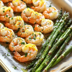 - 1 lb large shrimp, peeled and deveined - 1 bunch asparagus, trimmed - 4 cloves garlic, minced - 3 tablespoons olive oil Large shrimp are the star here. They should be fresh or thawed if frozen. Asparagus adds a nice crunch. Trim the ends to keep them tender. Garlic gives flavor and aroma. Olive oil helps everything cook well and adds richness. - Zest of 1 lemon - 2 tablespoons fresh lemon juice - 1 teaspoon dried oregano - 1 teaspoon smoked paprika - Salt and pepper to taste Lemon zest and juice brighten up the dish. They give a fresh, zesty taste. Dried oregano adds a bit of earthiness. Smoked paprika gives a gentle smokiness. Don't forget to add salt and pepper to enhance the flavors. - Fresh parsley, chopped Fresh parsley is a great garnish. It adds color and freshness. Just chop it up and sprinkle it on top before serving. It makes the dish look and taste even better. First, heat your oven to 400°F (200°C). This step is key for a great bake. Next, grab your shrimp and asparagus. Peel and devein the shrimp if needed. Trim the asparagus ends to make them tender. In a large bowl, combine the shrimp and asparagus. Add minced garlic, olive oil, lemon zest, and lemon juice. Sprinkle in oregano, smoked paprika, salt, and pepper. Now, toss everything well. You want each piece to be coated nicely. This blend of flavors is what makes the dish shine. Line a large baking sheet with parchment paper. This makes cleanup easy. Now, spread the shrimp and asparagus evenly on the sheet. Make sure the shrimp are facing up for even cooking. Bake in the preheated oven for 12-15 minutes. You’ll know it’s done when the shrimp turn pink and opaque. The asparagus should be tender yet crisp. Once done, remove it from the oven. Let it cool for a few minutes. Garnish with fresh parsley for color and taste. To cook shrimp just right, watch the time closely. Bake the shrimp for 12 to 15 minutes. The shrimp will turn pink and opaque when done. A good sign is when they curl slightly. To prevent overcooking, take the shrimp out once they are fully pink. If they stay in too long, they can become rubbery. Keep an eye on them during the last few minutes of baking. You can boost the flavor of your dish with extra seasonings. Try adding a pinch of red pepper flakes for heat. You can also mix in some lemon pepper for a zesty kick. Fresh herbs like basil or thyme can also add freshness. When it comes to side dishes, consider serving this shrimp with rice or a fresh salad. Quinoa or couscous also pairs well. These options will soak up the tasty juices from the shrimp. For easy cleanup, always line your baking sheet with parchment paper. This will help keep food from sticking and make washing up a breeze. After cooking, let the pan cool a bit before cleaning. Use warm, soapy water to wash it. If food is stuck, soak the pan for a few minutes. This will help lift the leftovers off. {{image_2}} You can swap asparagus with many other veggies. Broccoli, bell peppers, or zucchini work great. Each brings its own taste and texture. In fall, try Brussels sprouts or butternut squash. In winter, add kale or green beans. Seasonal veggies make this dish fresh and fun. If you're gluten-free, this dish fits perfectly. All the ingredients are naturally free of gluten. For low-carb options, leave out the olive oil or cut back on it. You can also skip the smoked paprika for fewer carbs. These changes keep the flavor while meeting your diet needs. Want to spice things up? Add a sprinkle of red pepper flakes for heat. Or toss in some diced jalapeños before baking. Fresh herbs like basil or cilantro can also change the taste. Experiment with thyme or rosemary for a new twist. Each choice adds a unique layer of flavor. To keep your shrimp and asparagus fresh, store leftovers right away. Place them in an airtight container. This helps keep the flavors and moisture. It is best to refrigerate them within two hours of cooking. To reheat without drying out, use the oven or stovetop. Preheat your oven to 300°F (150°C). Spread the shrimp and asparagus on a baking sheet. Heat for about 10 minutes until warm. On the stovetop, use a skillet on low heat. Add a splash of olive oil to keep it moist. If you want to freeze, make sure it cools first. Place the shrimp and asparagus in a freezer bag. Press out as much air as you can to prevent freezer burn. Label the bag with the date. To thaw, move it to the fridge overnight. Reheat as mentioned above once thawed. Yes, you can use frozen shrimp. Just make sure to thaw them first. Place the shrimp in a bowl of cold water for about 15-20 minutes. This method keeps the shrimp from cooking unevenly. After thawing, pat them dry with paper towels. This step helps the shrimp absorb the marinade better. Lemon garlic shrimp pairs well with many sides. Here are some ideas: - Rice: White or brown rice soaks up the sauce. - Quinoa: A healthy, nutty option that adds protein. - Salad: A fresh green salad adds crunch and color. - Pasta: Toss it with olive oil for a filling dish. - Bread: Serve with crusty bread to soak up the juices. Look for these signs to know when shrimp are done: - Color: The shrimp should turn pink and opaque. - Shape: They curl into a C shape when cooked. - Texture: Feel firm, not mushy. For asparagus, it should be tender but still crisp. If both look good, your dish is ready! This dish features large shrimp and asparagus, seasoned with garlic and lemon. I shared step-by-step instructions to help you cook it perfectly. Remember to check the shrimp for doneness and enjoy fresh pairings. You can also explore variations to suit your taste and dietary needs. Don't forget the cleanup tips for easy maintenance. By following these tips, you can savor a delicious and healthy meal with little fuss. Happy cooking!